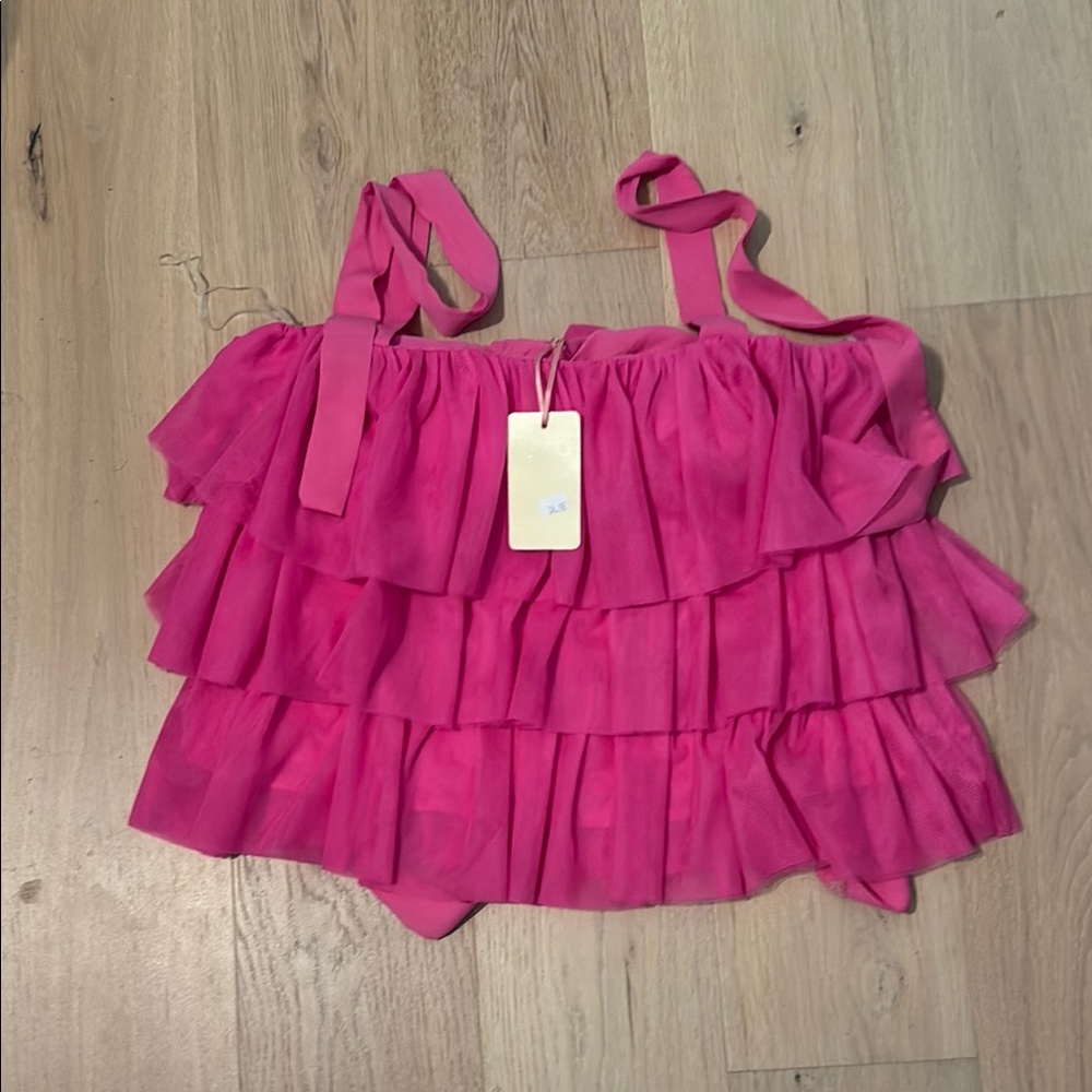 Ruffled tank top with tie sleeves